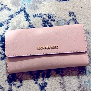 MK gently used wallet light pink color